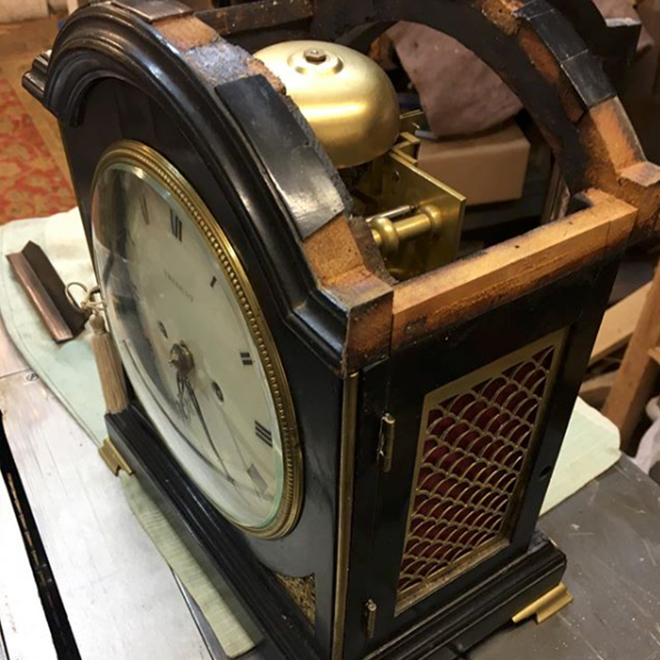 damaged clock case